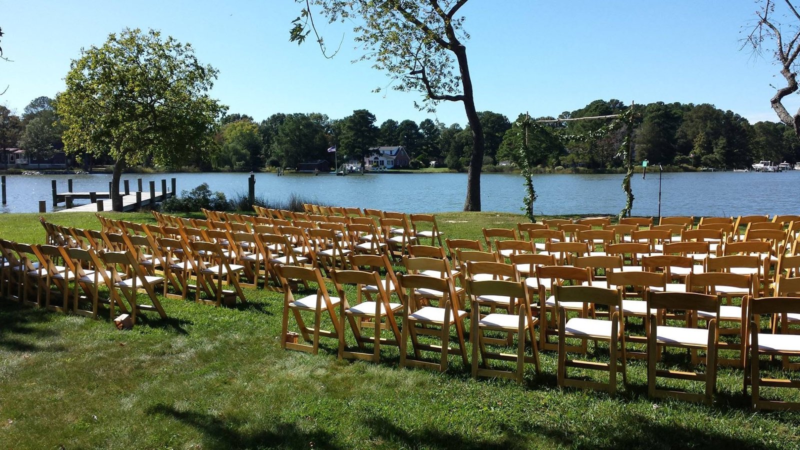 Samantha and Chris’s wedding, photo 3 — ceremony arbor by the water