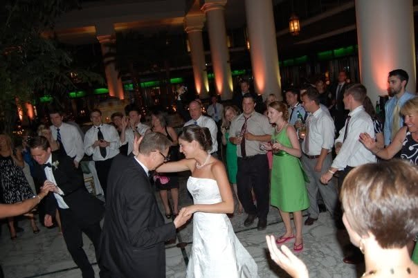 Wedding guests mingling and celebrating with drinks in hand